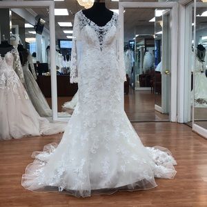 Ivory wedding gown with floral lace print, sequins